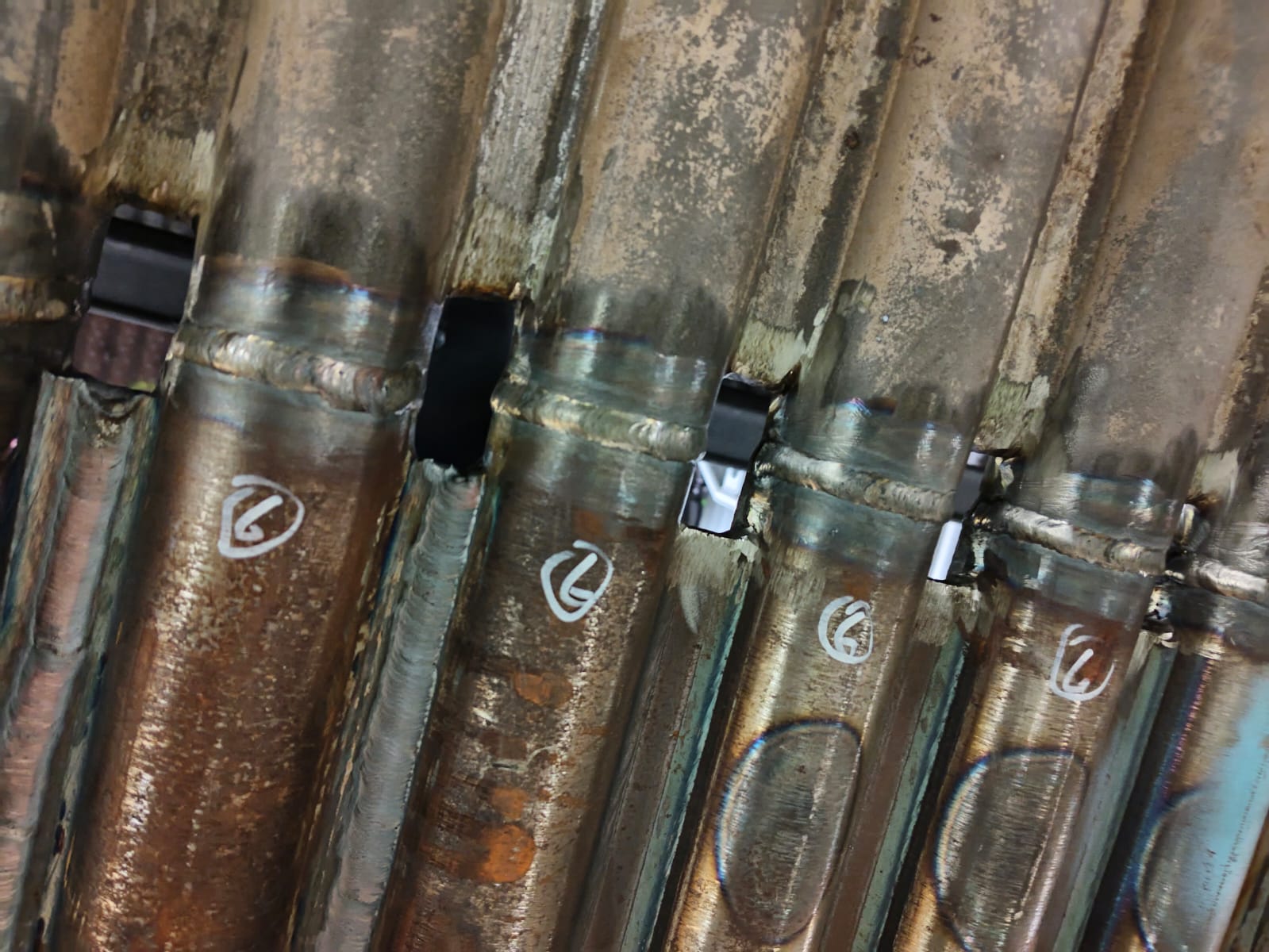 Completed welds on pressure-part tubes